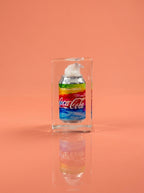 Rainbow coke trapped in a glass