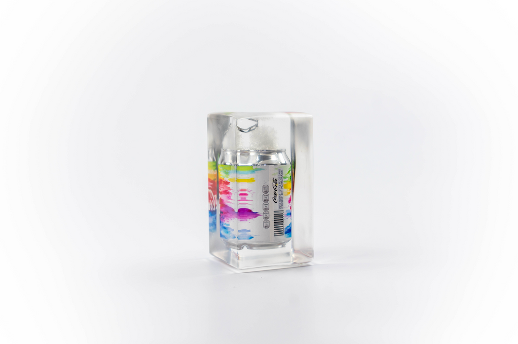Rainbow coke trapped in a glass