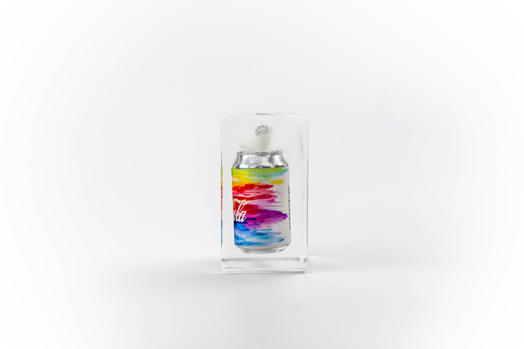Rainbow coke trapped in a glass