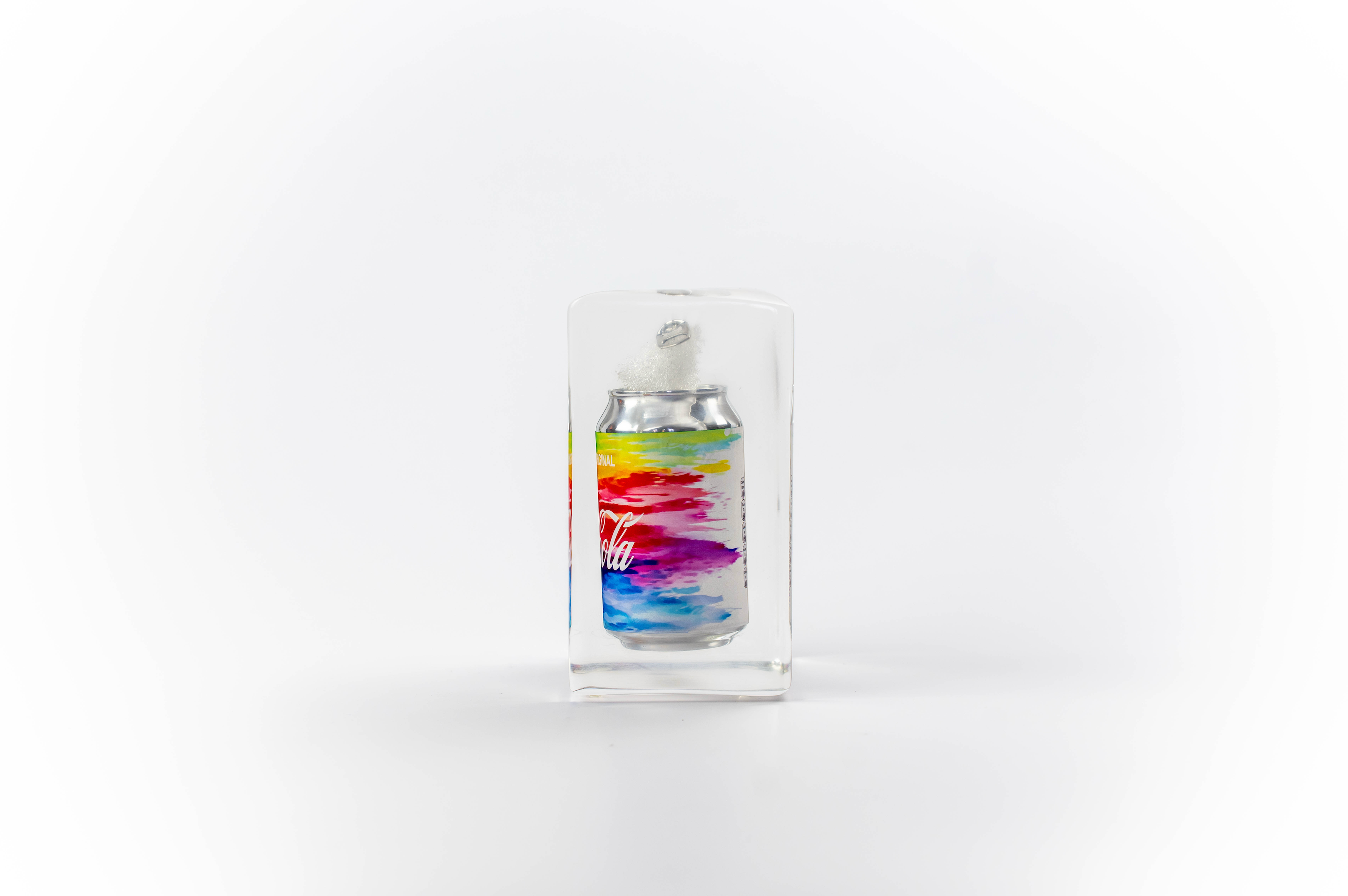 Rainbow coke trapped in a glass