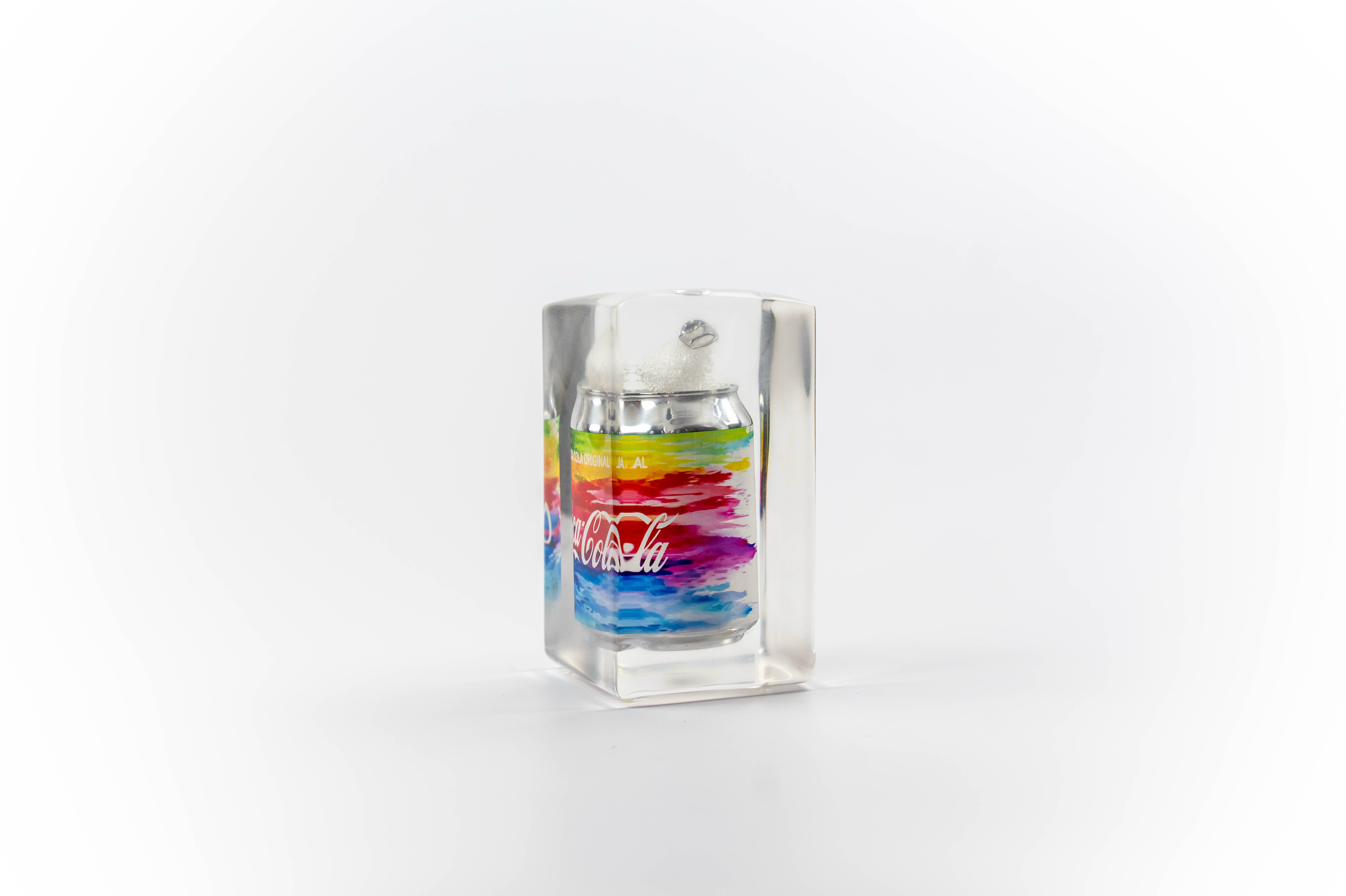 Rainbow coke trapped in a glass