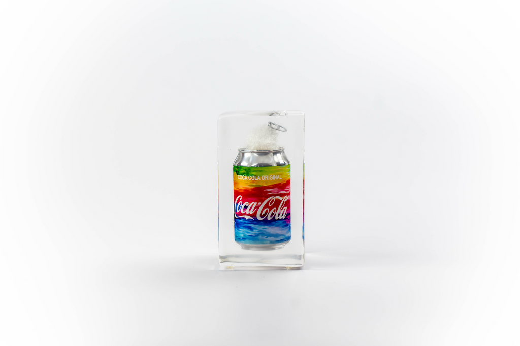 Rainbow coke trapped in a glass