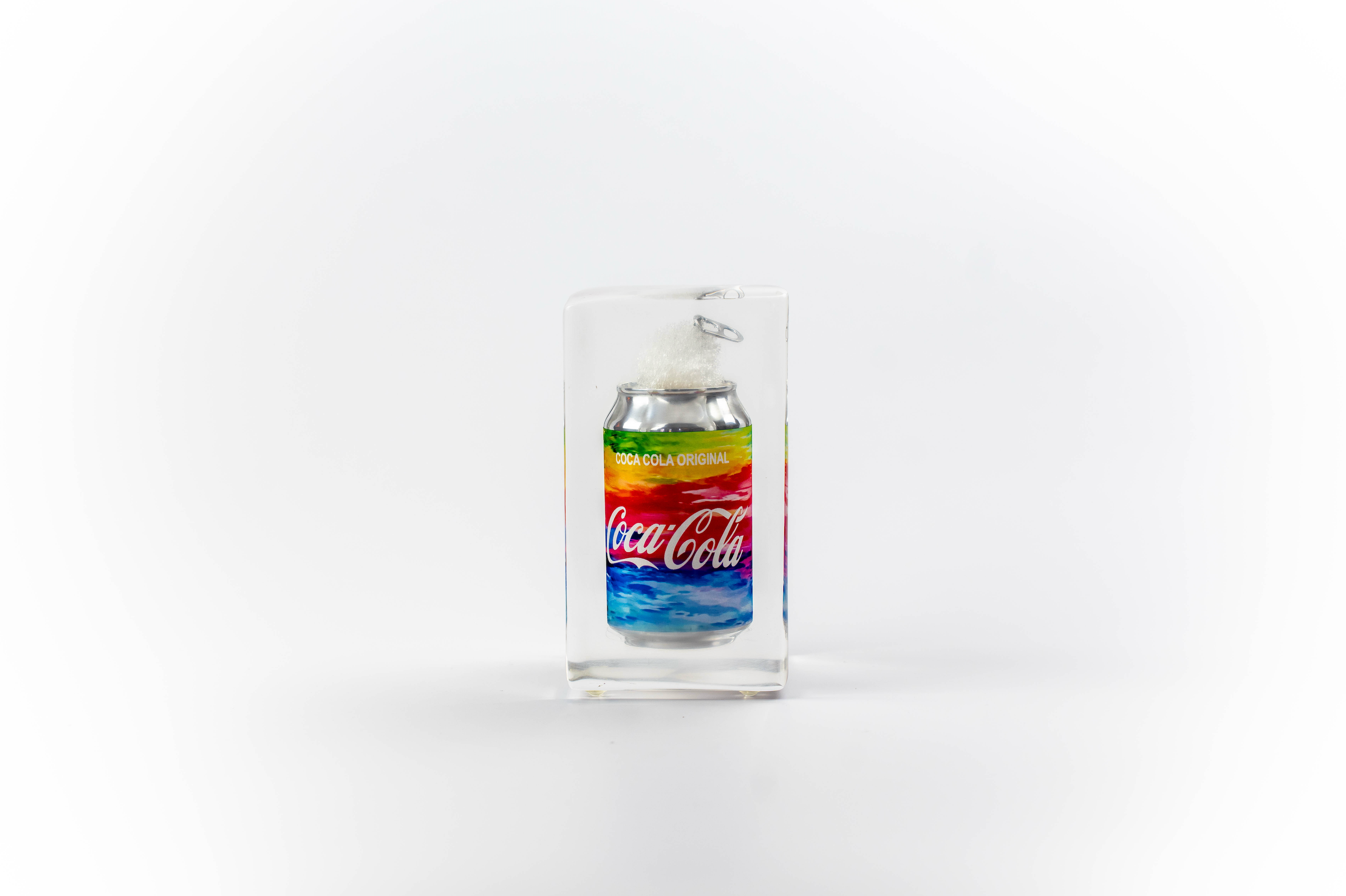Rainbow coke trapped in a glass
